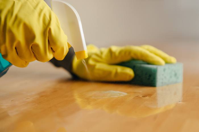 Scrubbing a surface clean after renovation work
